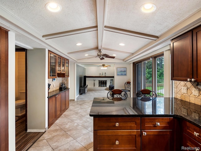 1890 Ludgate Ln, Rochester Hills, MI 48309 - kitchen featuring ceiling fan, a peninsula, backsplash, recessed lighting, and glass insert cabinets