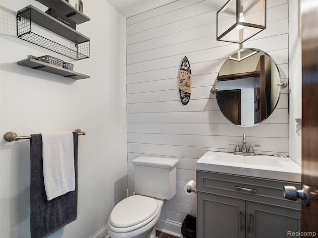 1890 Ludgate Ln, Rochester Hills, MI 48309 - half bathroom featuring vanity and wooden walls