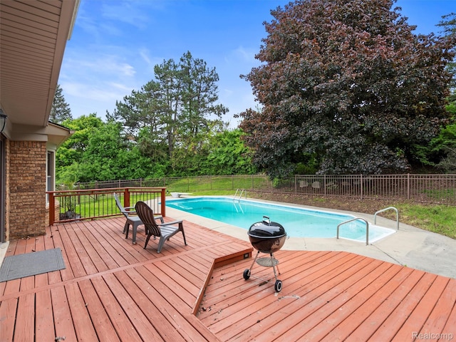 1890 Ludgate Ln, Rochester Hills, MI 48309 - view of pool featuring a fenced backyard, a deck, and view of scattered trees
