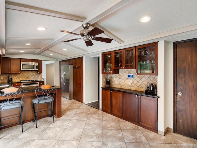1890 Ludgate Ln, Rochester Hills, MI 48309 - kitchen featuring stainless steel appliances, backsplash, dark countertops, glass insert cabinets, and ceiling fan