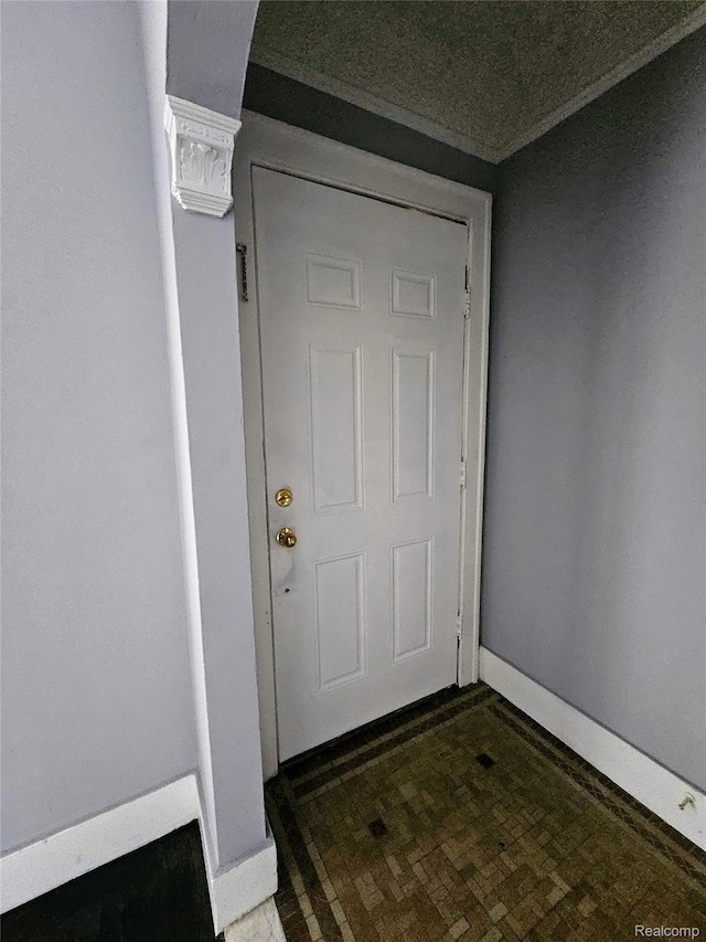 12645 Cloverlawn St, Detroit, MI 48238 - doorway to outside featuring baseboards