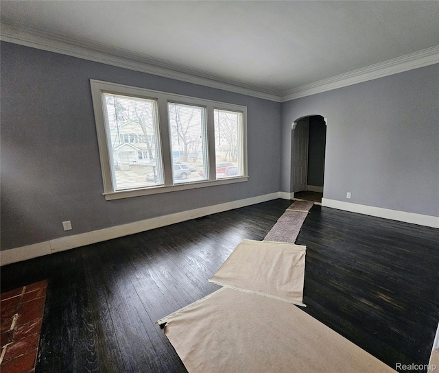 12645 Cloverlawn St, Detroit, MI 48238 - unfurnished room featuring arched walkways, crown molding, and wood-type flooring