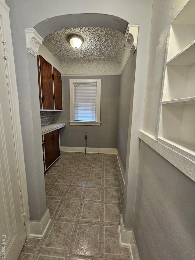 12645 Cloverlawn St, Detroit, MI 48238 - washroom with a textured ceiling and baseboards