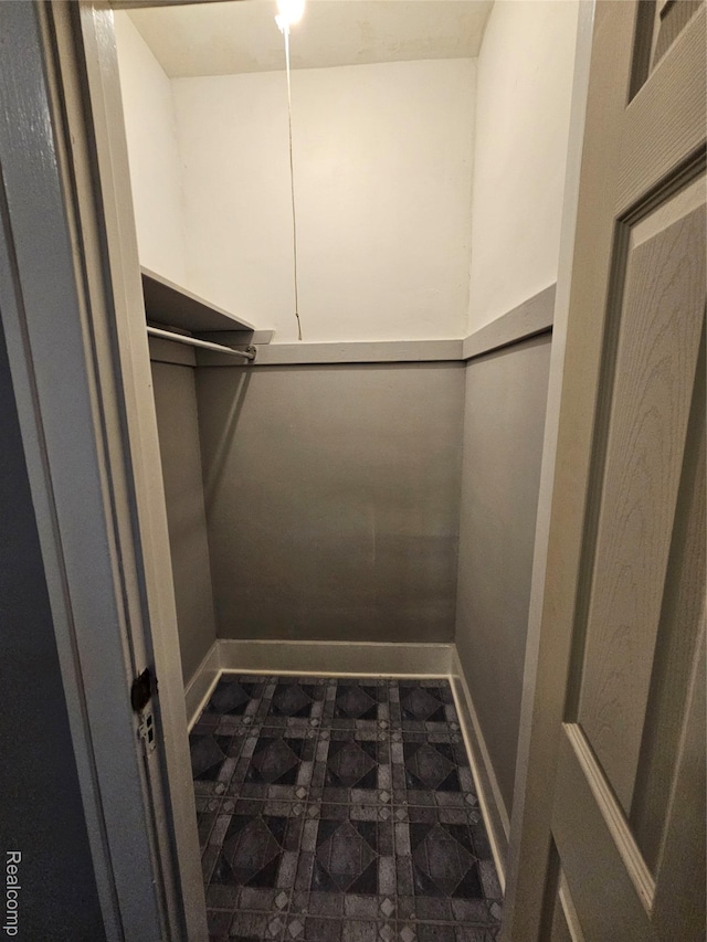12645 Cloverlawn St, Detroit, MI 48238 - walk in closet with dark flooring