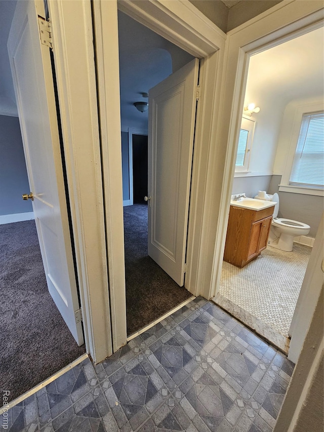 12645 Cloverlawn St, Detroit, MI 48238 - hallway featuring dark colored carpet