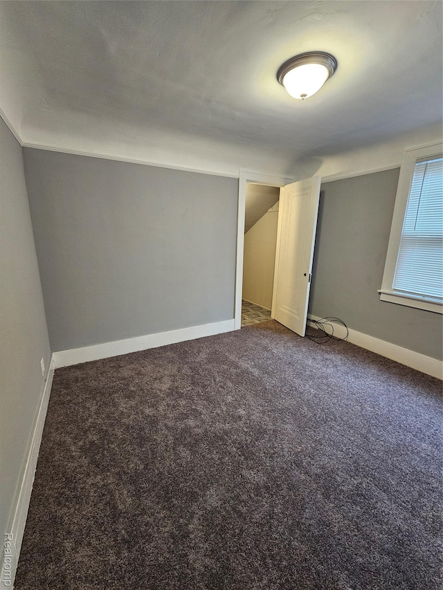 12645 Cloverlawn St, Detroit, MI 48238 - carpeted spare room featuring baseboards