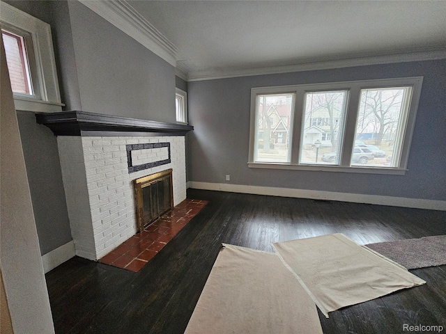12645 Cloverlawn St, Detroit, MI 48238 - unfurnished living room featuring crown molding, a fireplace, and dark wood-type flooring