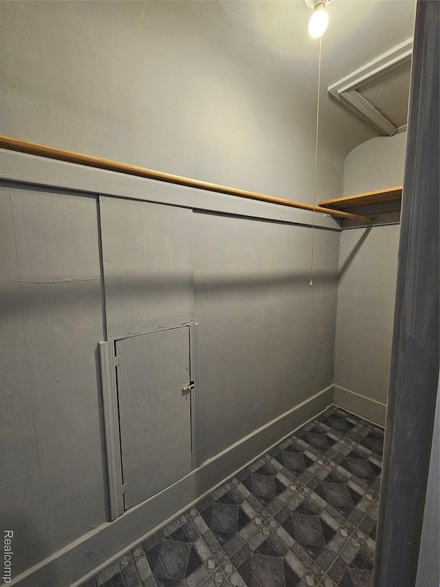 12645 Cloverlawn St, Detroit, MI 48238 - spacious closet featuring dark floors