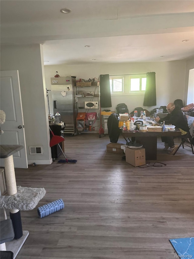 19374 Five Points St, Redford, MI 48240 - living room with wood finished floors, recessed lighting, and a desk