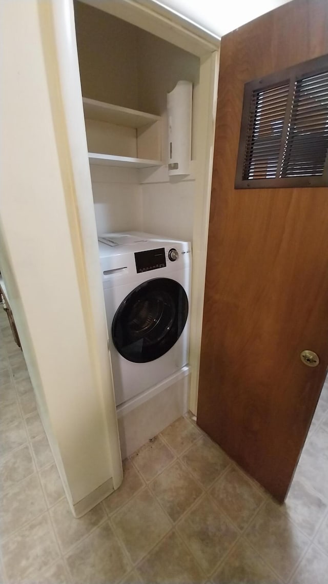 5037 Old Colony Rd, Portage, MI 49024 - laundry room with washer / clothes dryer and water heater