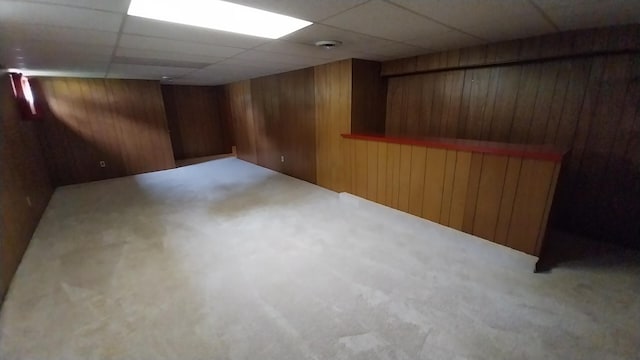 5037 Old Colony Rd, Portage, MI 49024 - finished basement with carpet, wooden walls, and a paneled ceiling