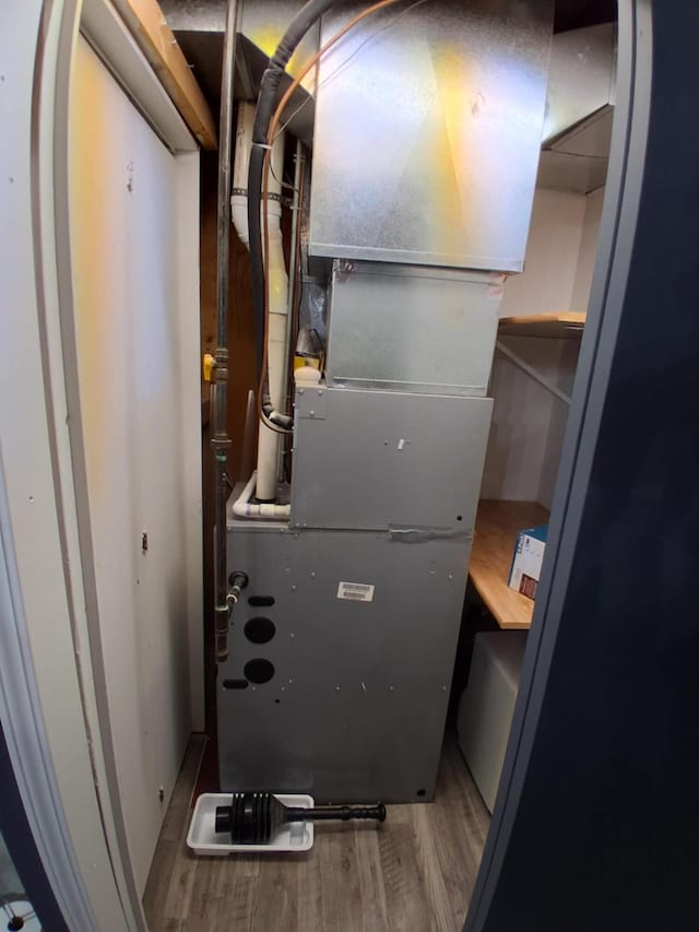 5397 E 80th St, Newaygo, MI 49337 - utility room with heating unit