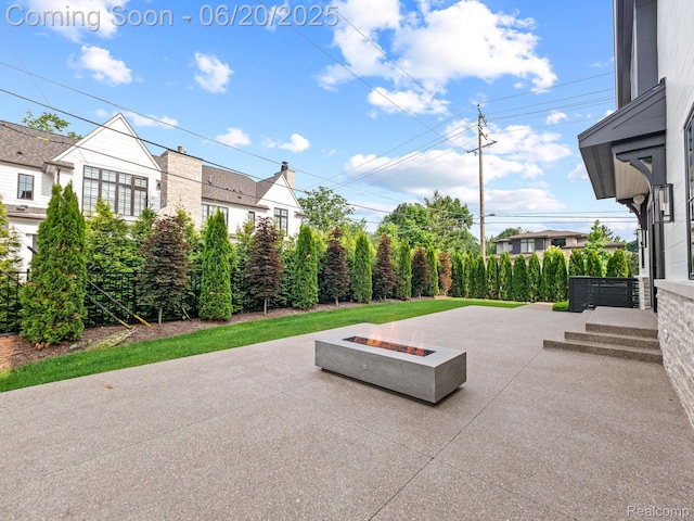 1120 Lyonhurst St, Birmingham, MI 48009 - view of patio / terrace featuring an outdoor fire pit
