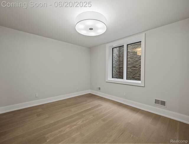 1120 Lyonhurst St, Birmingham, MI 48009 - spare room with wood finished floors