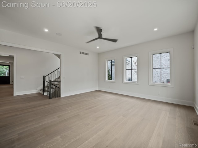 1120 Lyonhurst St, Birmingham, MI 48009 - unfurnished room featuring healthy amount of natural light, stairs, a ceiling fan, wood finished floors, and recessed lighting