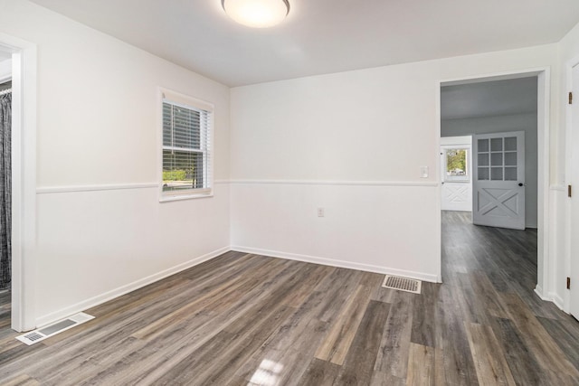922 Marion Ave, Big Rapids, MI 49307 - spare room with wood finished floors and plenty of natural light
