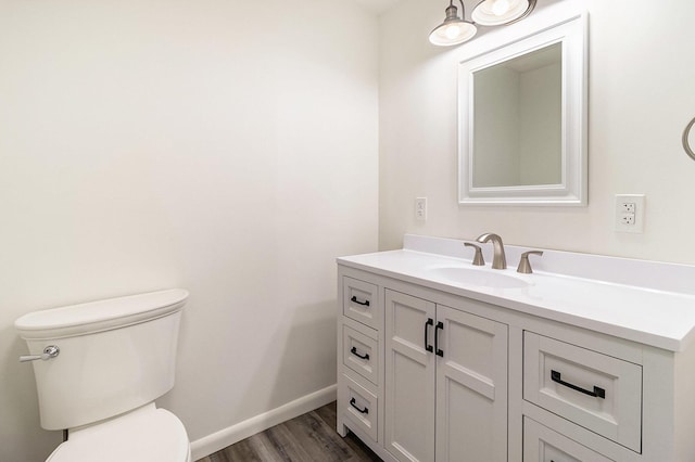 922 Marion Ave, Big Rapids, MI 49307 - bathroom with vanity and wood finished floors
