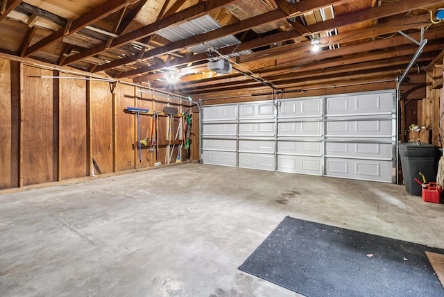 922 Marion Ave, Big Rapids, MI 49307 - garage featuring a garage door opener