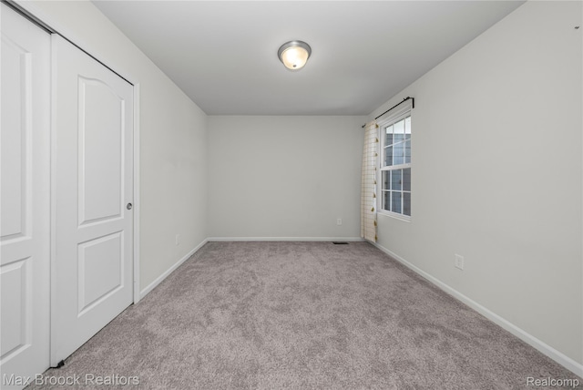 43629 Prospect Unit 102, Novi, MI 48375 - carpeted spare room featuring baseboards