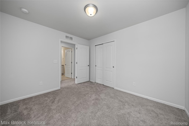 43629 Prospect Unit 102, Novi, MI 48375 - unfurnished bedroom with carpet flooring and a closet