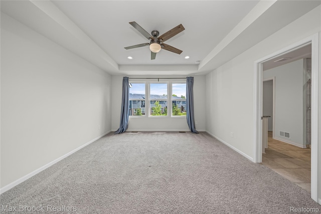 43629 Prospect Unit 102, Novi, MI 48375 - carpeted empty room with a ceiling fan, recessed lighting, and a raised ceiling
