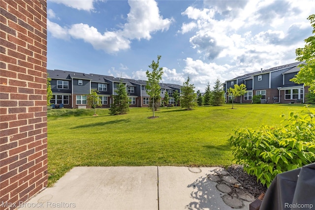 43629 Prospect Unit 102, Novi, MI 48375 - view of green lawn with a residential view