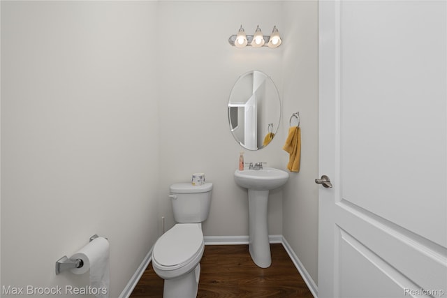 43629 Prospect Unit 102, Novi, MI 48375 - half bath featuring wood finished floors and toilet