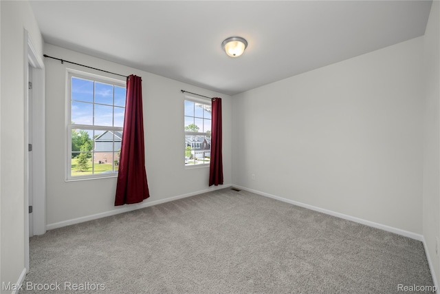 43629 Prospect Unit 102, Novi, MI 48375 - carpeted spare room with baseboards