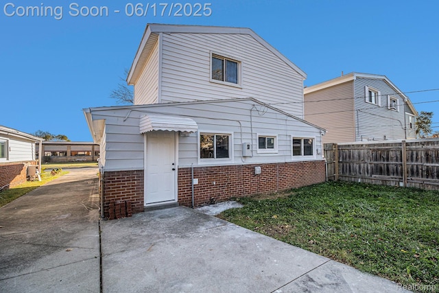 408 W Jarvis Ave, Hazel Park, MI 48030 - rear view of house with brick siding