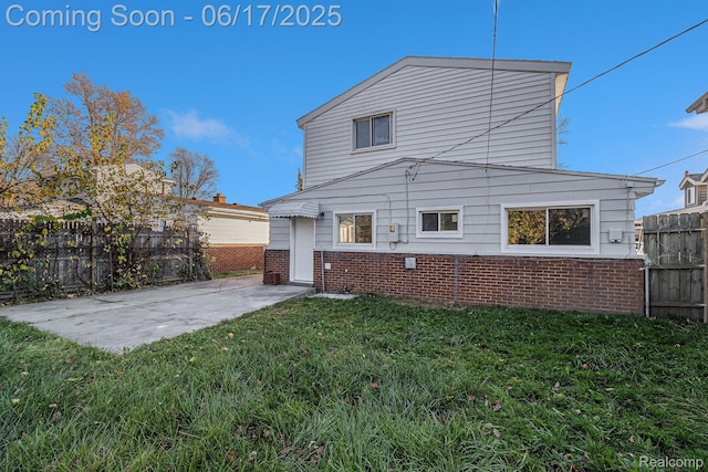 408 W Jarvis Ave, Hazel Park, MI 48030 - back of house with brick siding and a patio area
