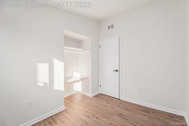 408 W Jarvis Ave, Hazel Park, MI 48030 - empty room with light wood-style floors and baseboards