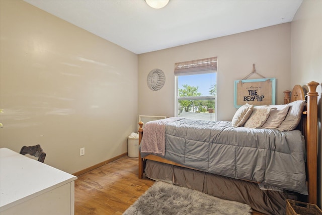 857 Kalamazoo St, South Haven, MI 49090 - bedroom featuring light wood-type flooring and baseboards