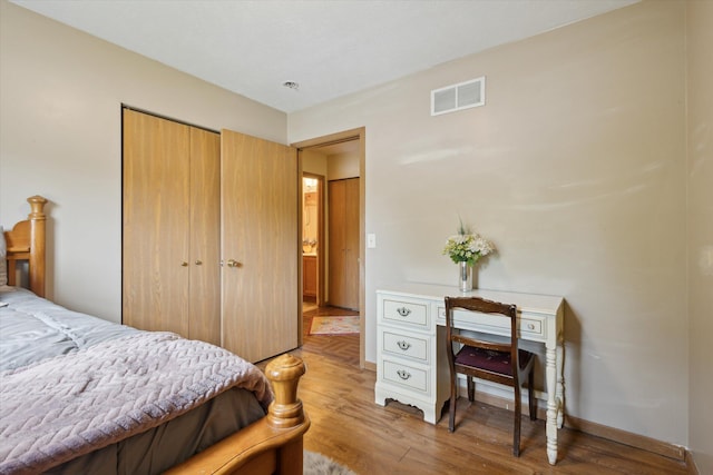 857 Kalamazoo St, South Haven, MI 49090 - bedroom with light wood finished floors and a closet