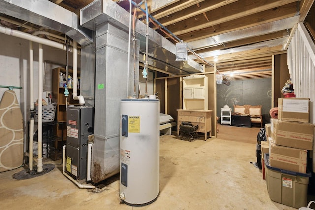 857 Kalamazoo St, South Haven, MI 49090 - unfinished below grade area featuring water heater