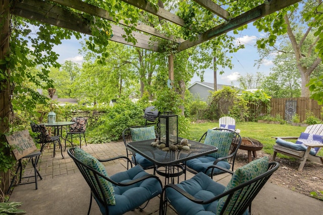 857 Kalamazoo St, South Haven, MI 49090 - view of patio featuring outdoor dining area and a pergola