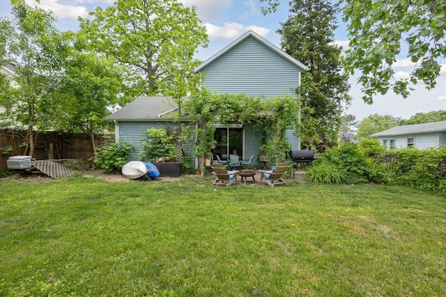 857 Kalamazoo St, South Haven, MI 49090 - back of property with an outdoor fire pit