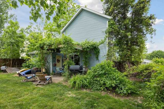 857 Kalamazoo St, South Haven, MI 49090 - rear view of house with a patio