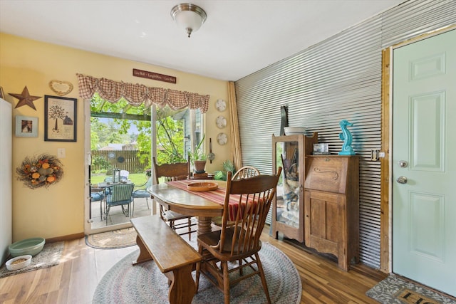 857 Kalamazoo St, South Haven, MI 49090 - dining area with wood finished floors and baseboards