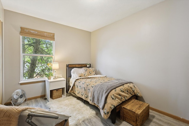 857 Kalamazoo St, South Haven, MI 49090 - bedroom featuring baseboards and wood finished floors