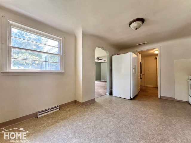 435 Brandon St, Owosso, MI 48867 - empty room featuring baseboards