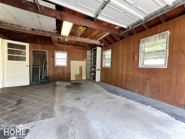 435 Brandon St, Owosso, MI 48867 - garage with wooden walls