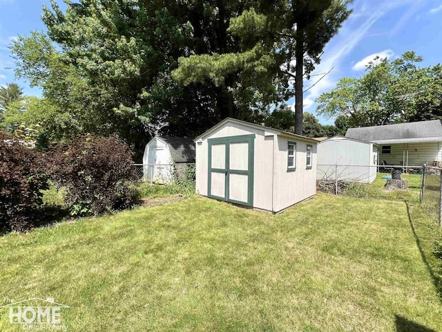435 Brandon St, Owosso, MI 48867 - view of shed with a fenced backyard