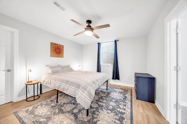 6143 Pheasant Ct, Berrien Springs, MI 49103 - bedroom featuring light wood finished floors and a ceiling fan
