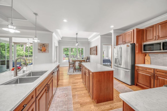 6143 Pheasant Ct, Berrien Springs, MI 49103 - kitchen featuring stainless steel appliances, light wood-style floors, pendant lighting, recessed lighting, and brown cabinetry