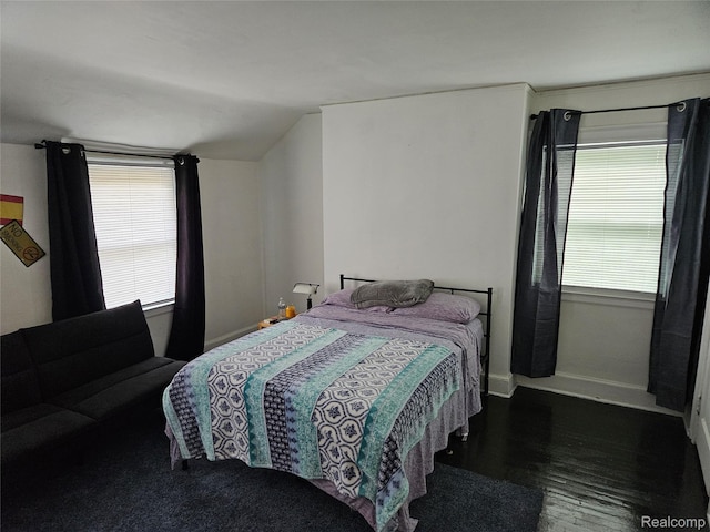 4294 W Buena Vista St, Detroit, MI 48238 - bedroom with baseboards and wood finished floors