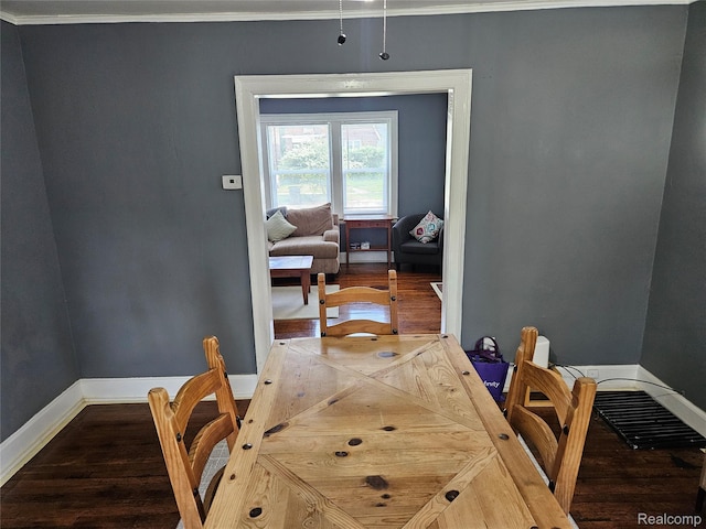 4294 W Buena Vista St, Detroit, MI 48238 - dining area with wood finished floors and ornamental molding
