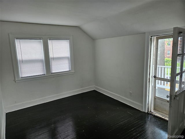 4294 W Buena Vista St, Detroit, MI 48238 - additional living space with lofted ceiling and dark wood-type flooring