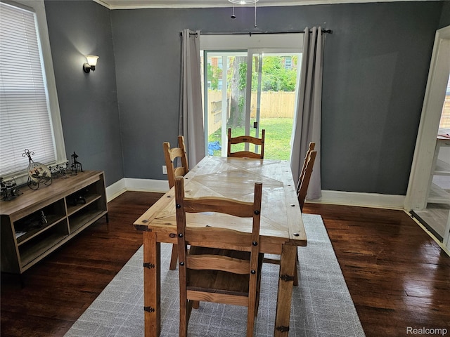 4294 W Buena Vista St, Detroit, MI 48238 - dining room featuring baseboards and wood finished floors
