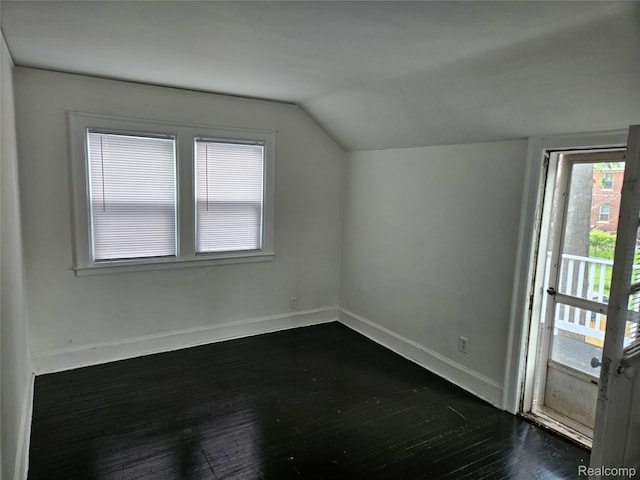 4294 W Buena Vista St, Detroit, MI 48238 - bonus room with vaulted ceiling and dark wood-type flooring