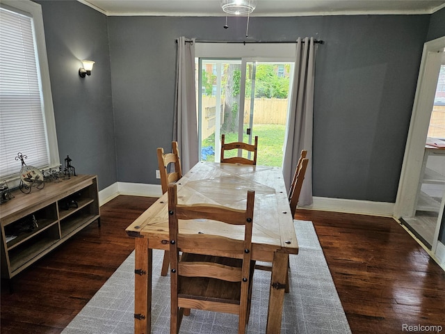 4294 W Buena Vista St, Detroit, MI 48238 - dining area featuring wood finished floors and crown molding